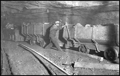 Boy braking on motor train - Gary West Virginia - 1908