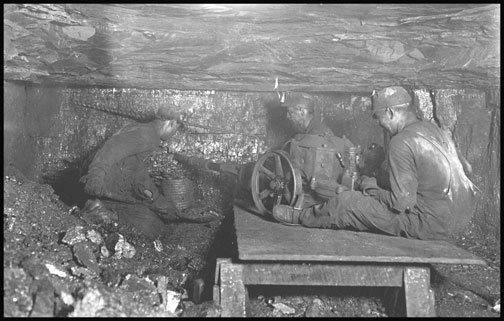 Man digging coal by machinery - Brown Mine - West Virginia - 1908